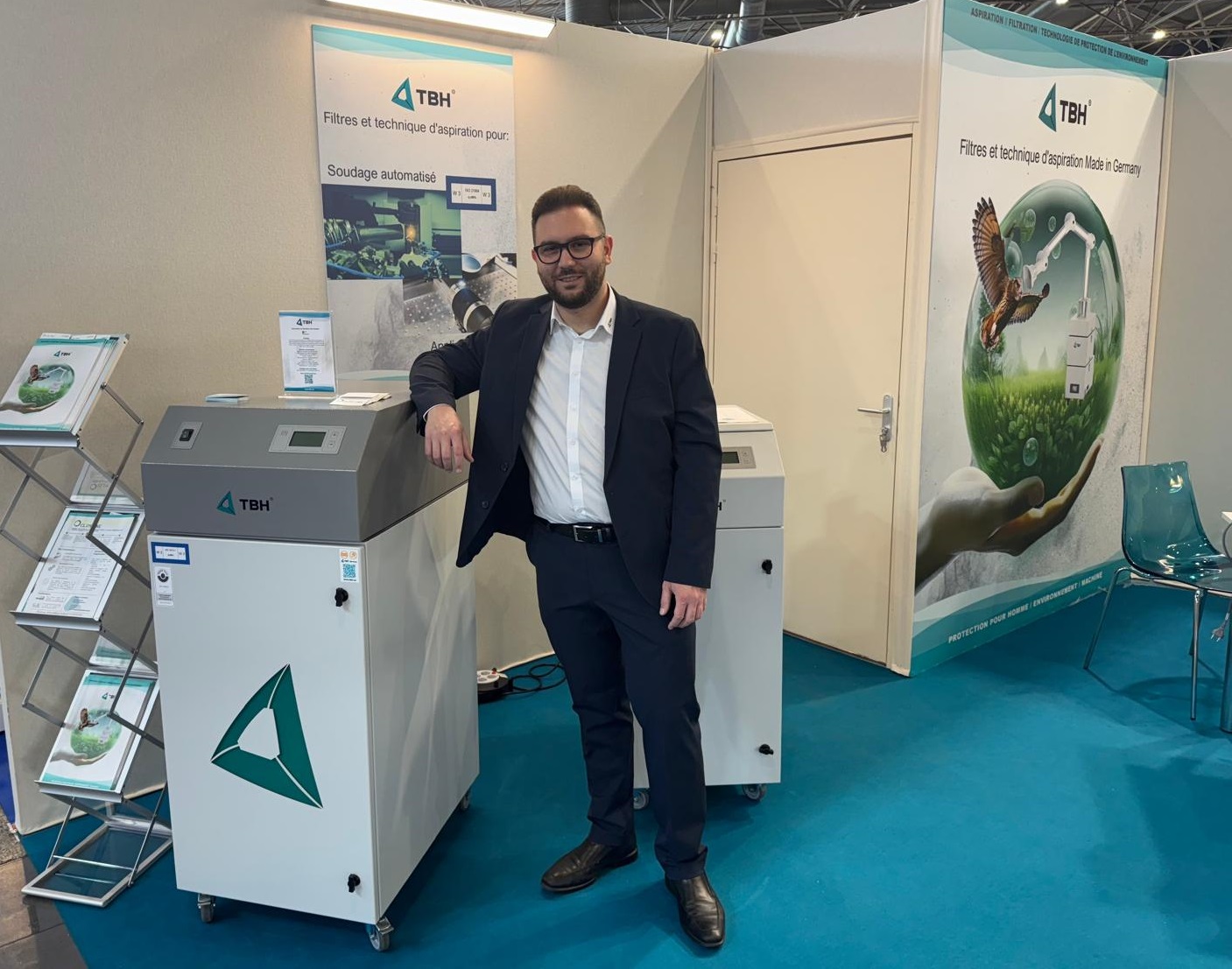 Michail Mathioudakis auf der Global Industry am Messestand der TBH GmbH.